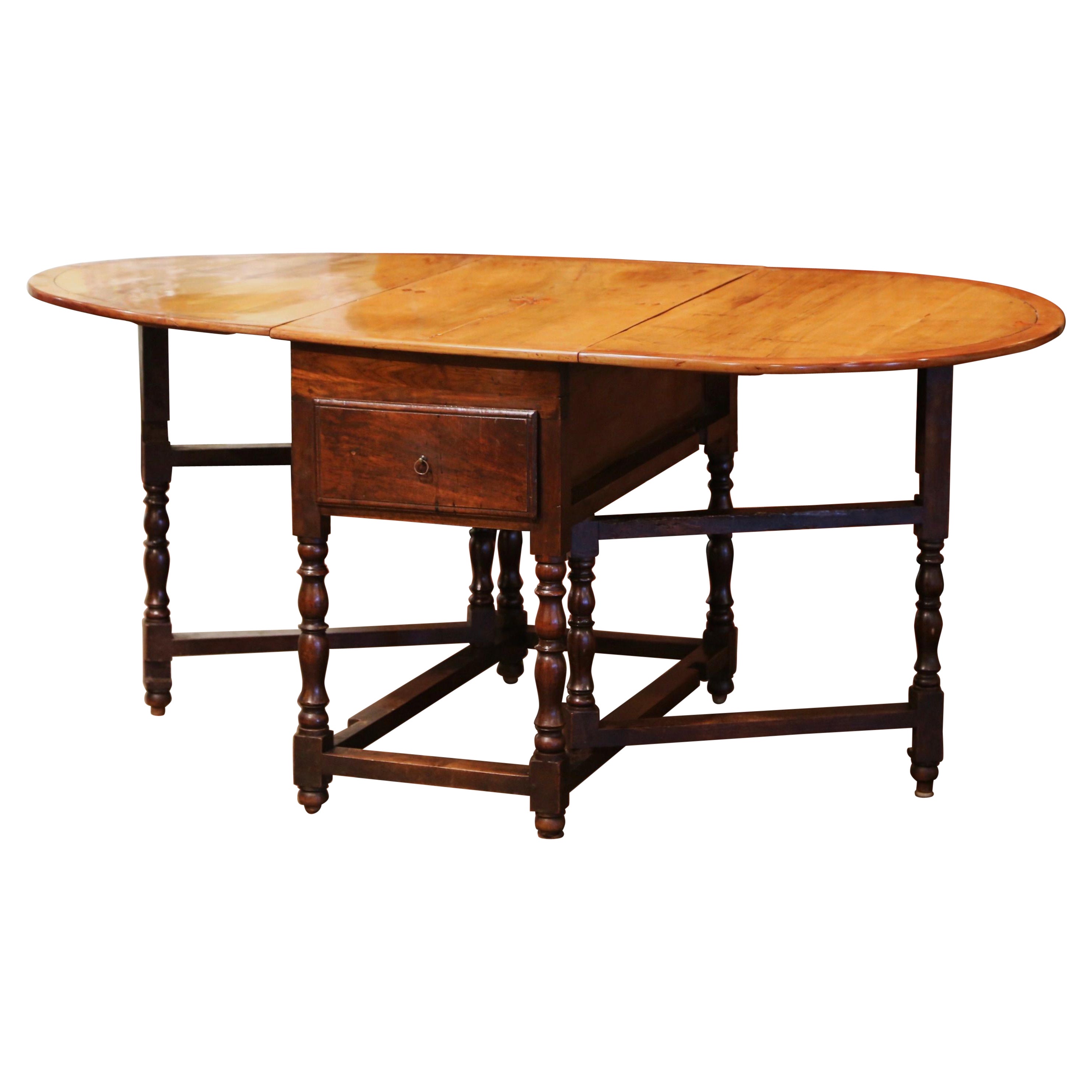 19th Century French Carved Walnut Oval Eight-Leg Drop-Leaf Table with Drawers