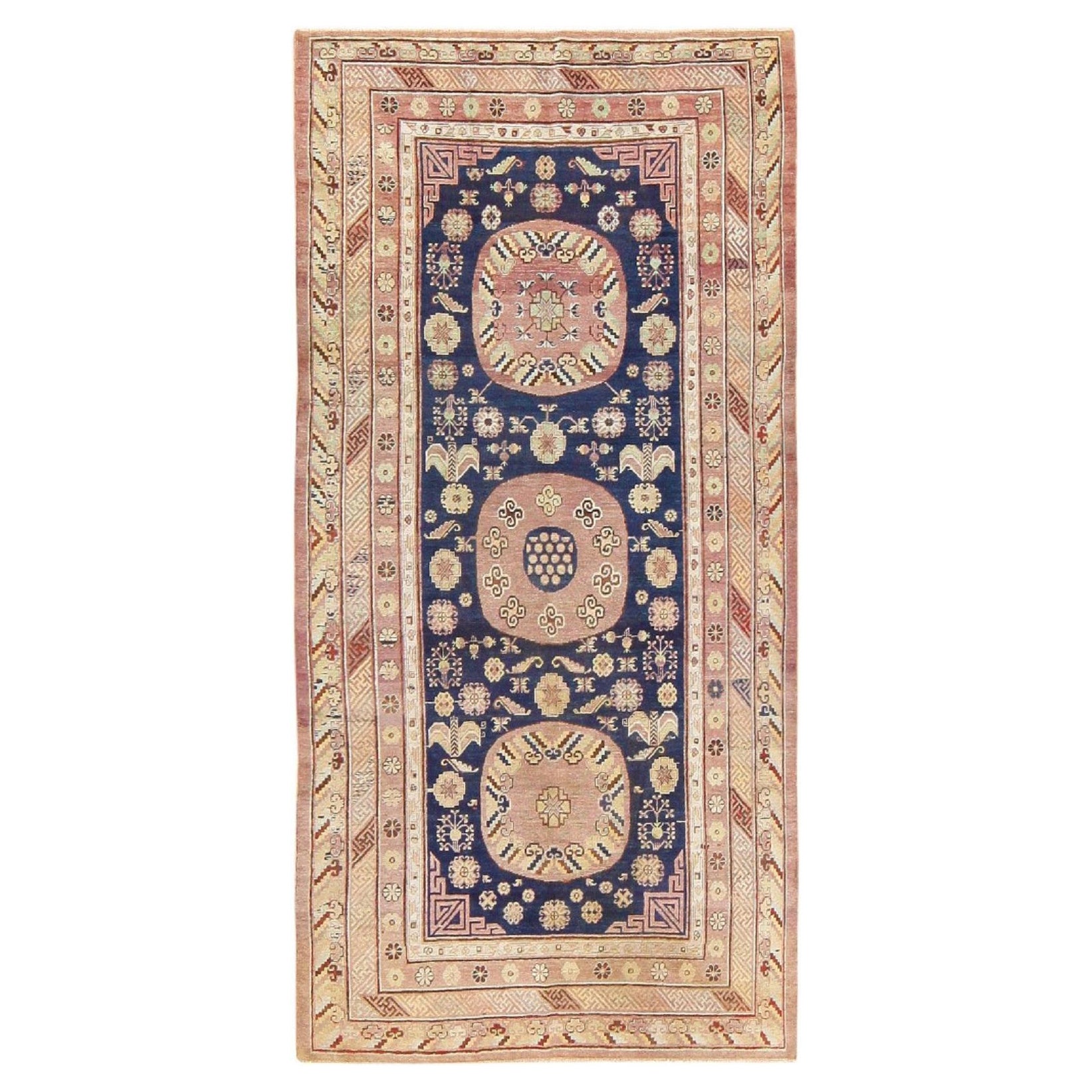 Antique Khotan Carpet from East Turkestan. 5 ft 5 in x 11 ft For Sale