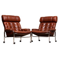 1960s Pair Easy / Armchairs in Chrome and Aged Brown /Cognac Leather by Lindlöfs