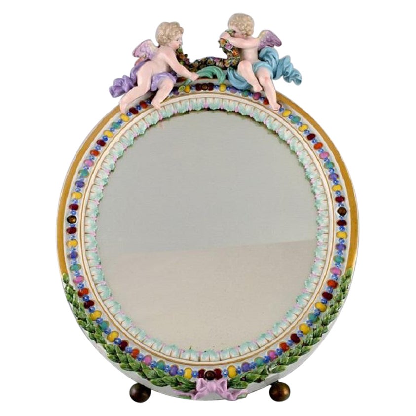 Antique Meissen Porcelain Mirror with Original Glass. Decorated with Putti