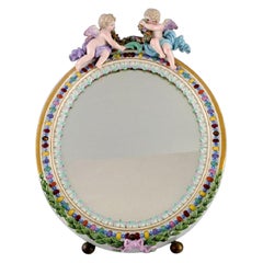 Antique Meissen Porcelain Mirror with Original Glass. Decorated with Putti