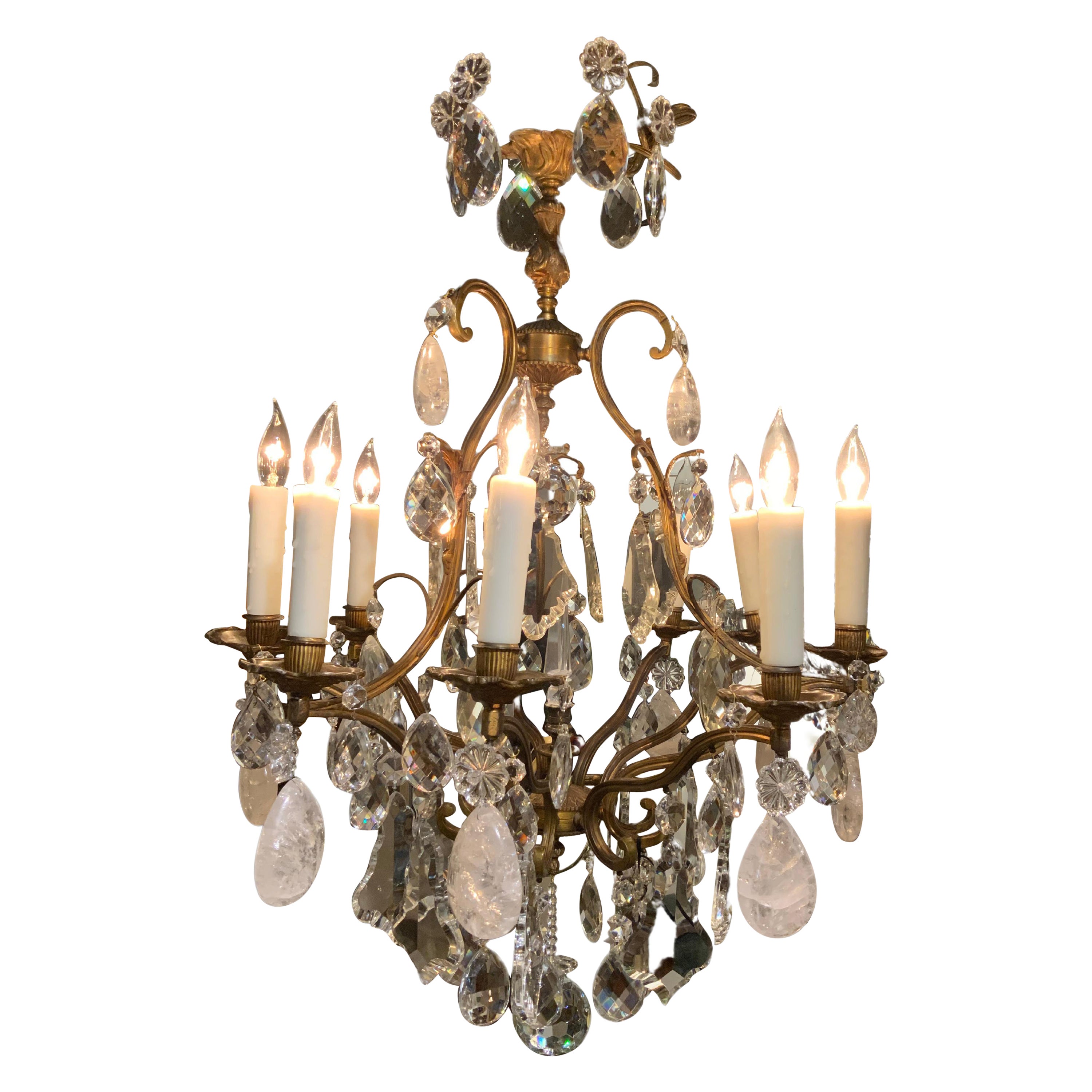 Bronze and Crystal Nine Light Chandelier with Scrolling Arms and Rock Crystals