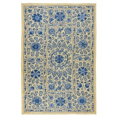 4.8x7 Ft Suzani Embroidered Cotton & Silk Wall Hanging in Beige and Light Blue