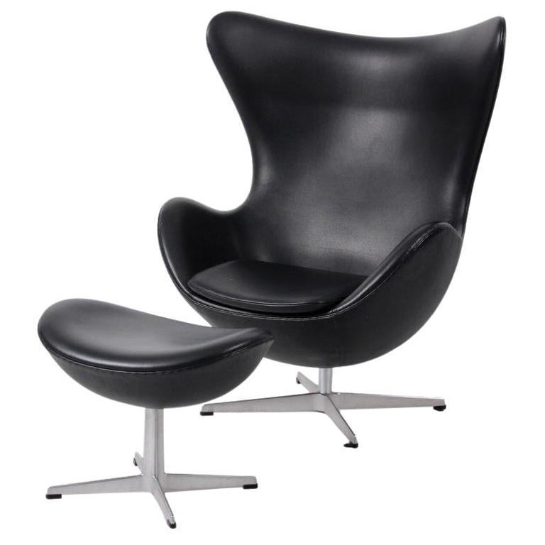 Arne Jacobsen Black Egg Chair and Footstool by Fritz Hansen in Denmark