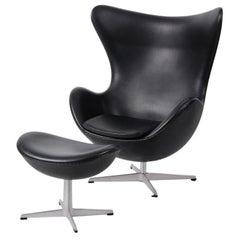 Vintage Arne Jacobsen Black Egg Chair and Footstool by Fritz Hansen in Denmark