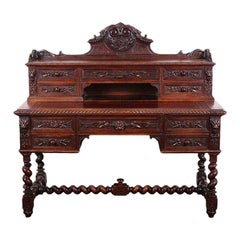 Bureau anglais en chêne sculpté de style néo-renaissance