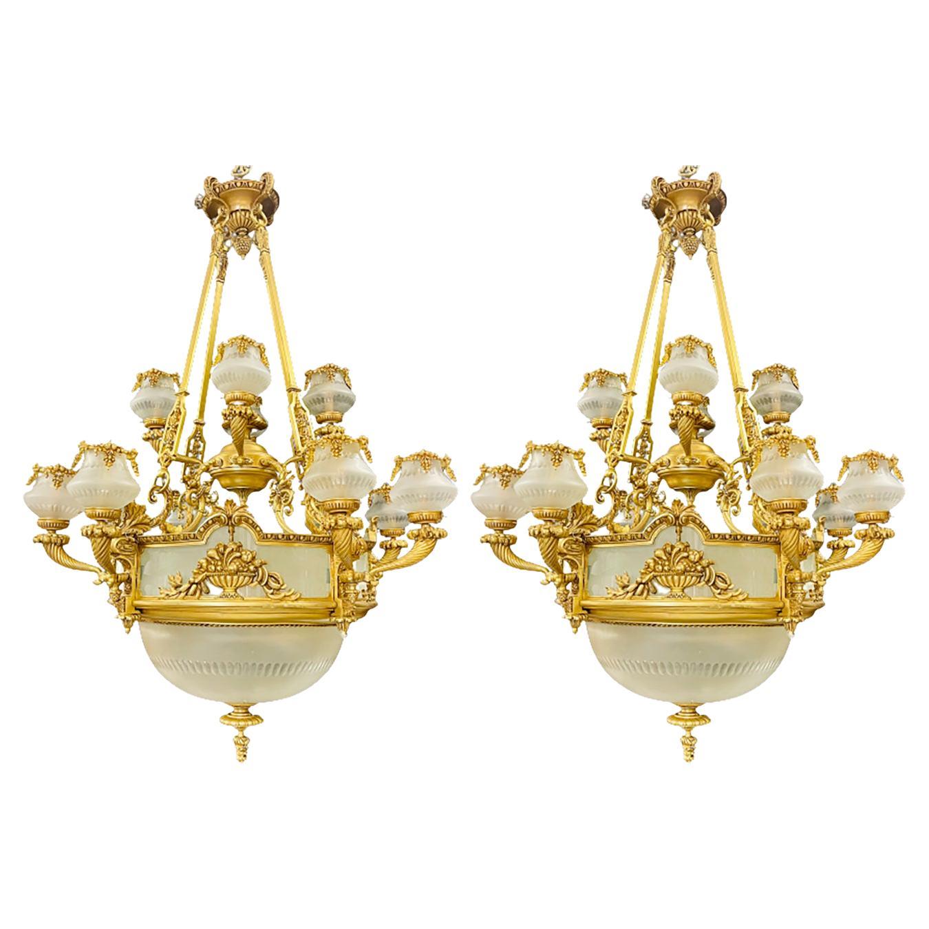 Pair of Louis XVI Style Bronze Chandeliers For Sale