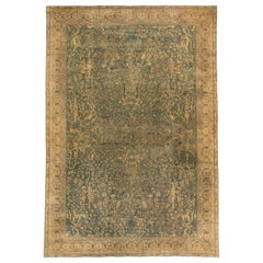 Ancien tapis indien en laine fait à la main