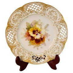 KPM Cabinet Plate with Intricate Reticulation and a Central Painting of Pansies