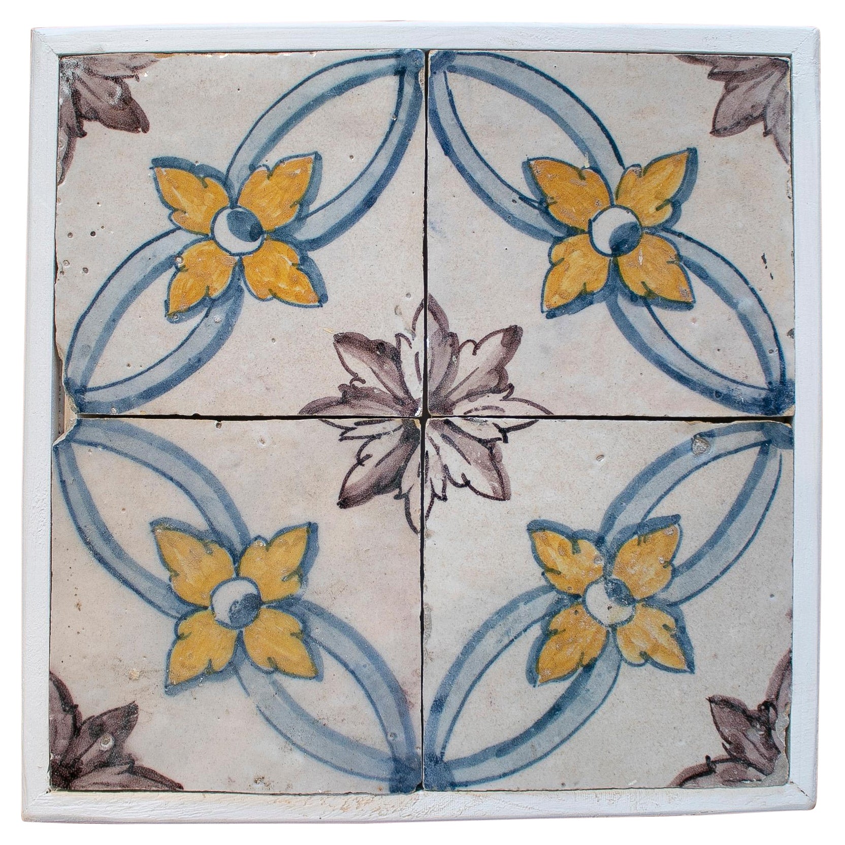 Set of Four 19th Century Portuguese Hand Painted Glazed Ceramic Patterned Tiles