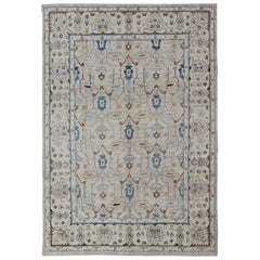 Khotan-Teppich im Khotan-Design mit geometrischem All-Over-Muster in Blau, Braun, Hellbraun und Blau
