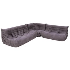 Canapé et repose-pieds modulaires gris Togo Ligne Roset de Michel Ducaroy, lot de 3