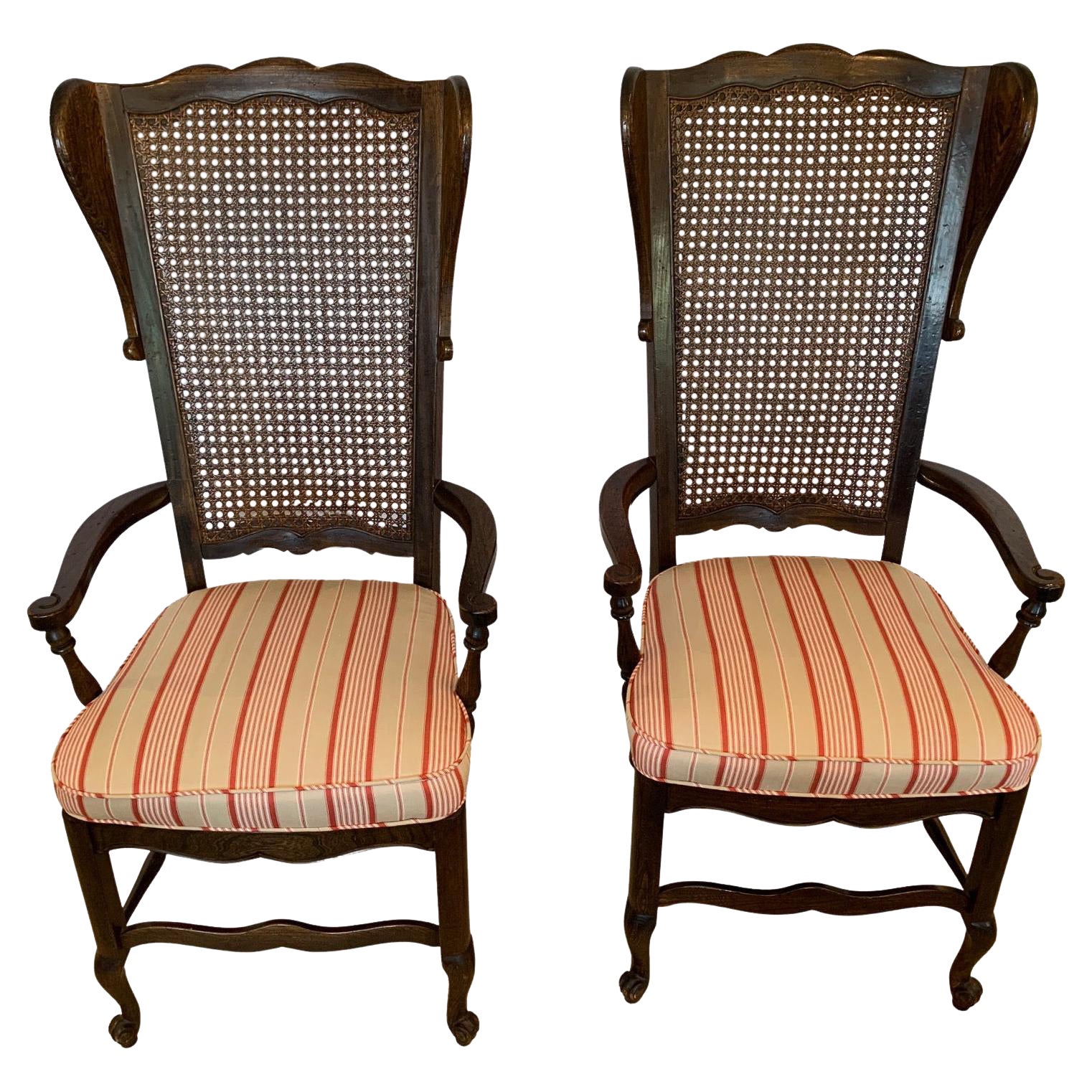 Stylish Pair of Caned Back Armchairs with Wings and Upholstered Seats