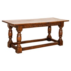 Antique Dark Oak Refectory Library Table with Decoratively Carved Skirt from Fra