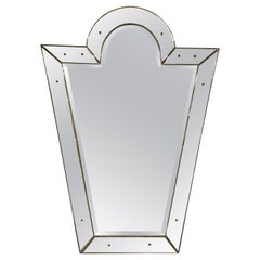 Espejo veneciano de cristal biselado en forma de "ojo de cerradura", estilo Hollywood Regency