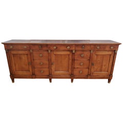 Buffet largo Luis XVI de madera de olmo y peral de la provincia francesa