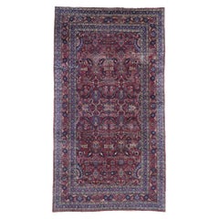 Antique Persian Mashhad Rug with Rustic Victorian Style
