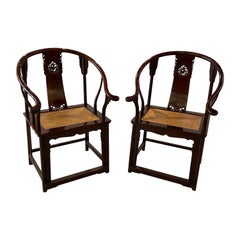 Pair of Antique Hand Carved Chinese Horseshoe Back Arm Chairs