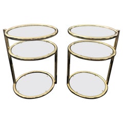 Pair of Swivel Brass and Glass End Tables