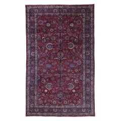 Tapis persan ancien Mashhad avec style élisabéthain victorien