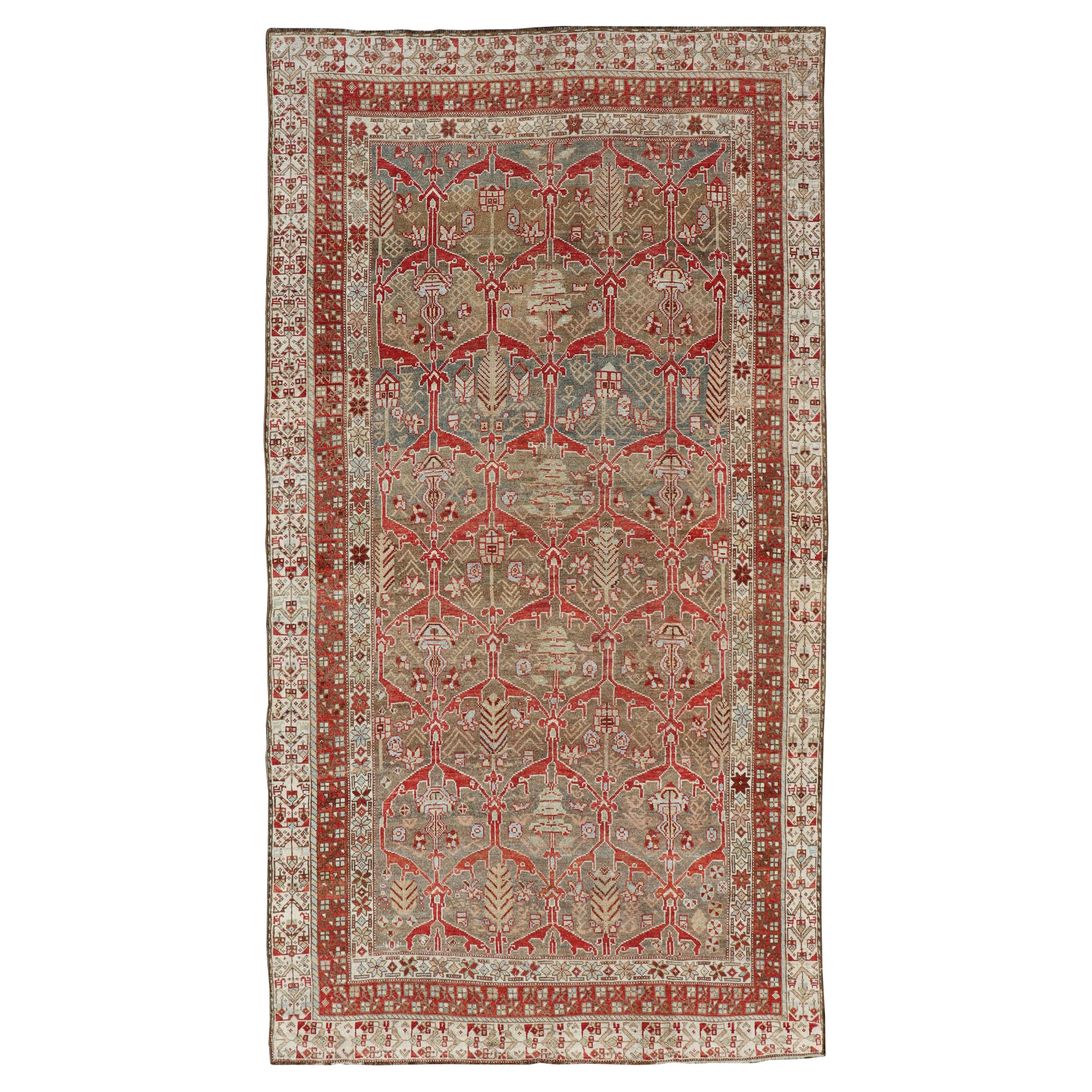 Kurdish Antique Gallery Runner with Tribal Design in Light Green, Tan and Red For Sale