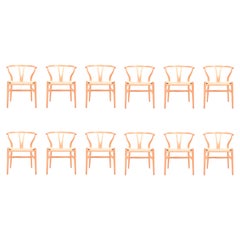 Set of Twelve Midcentury Wishbone Chairs in Patinated Oak by Hans Wegner, 1960s