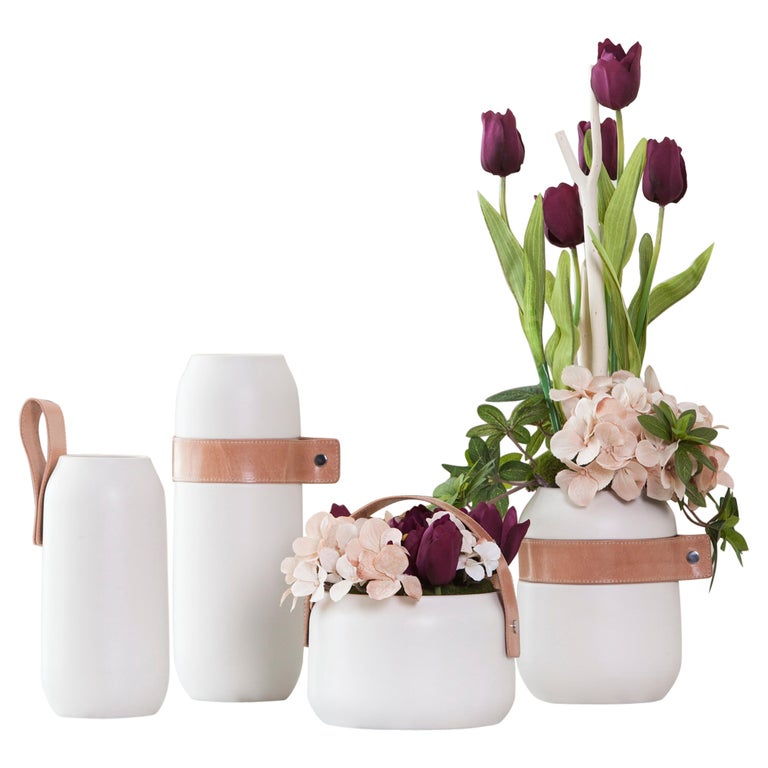 21st Century Contemporary Modern Set of 4 White Ceramic Vases Philip with Leather Handles and Metallic Buttons Handcrafted in Portugal - Europe by Greenapple.

This beautiful set includes four waterproof ceramic vases, perfect to be displayed