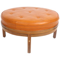 Vintage Gerry Zanck for Gregori, Round Orange Leather Pouf or Ottoman on Walnut base 