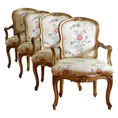 18th Century Italian Rococo Set of Four Giltwood Arm Chairs