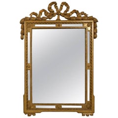 French Louis XVI Style 19th Century Giltwood Mirror with Ribbon-Tied Swag Crest