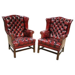 Pair Genuine Leather Oxblood Chesterfield Chippendale Style Mahogany Wing Chairs