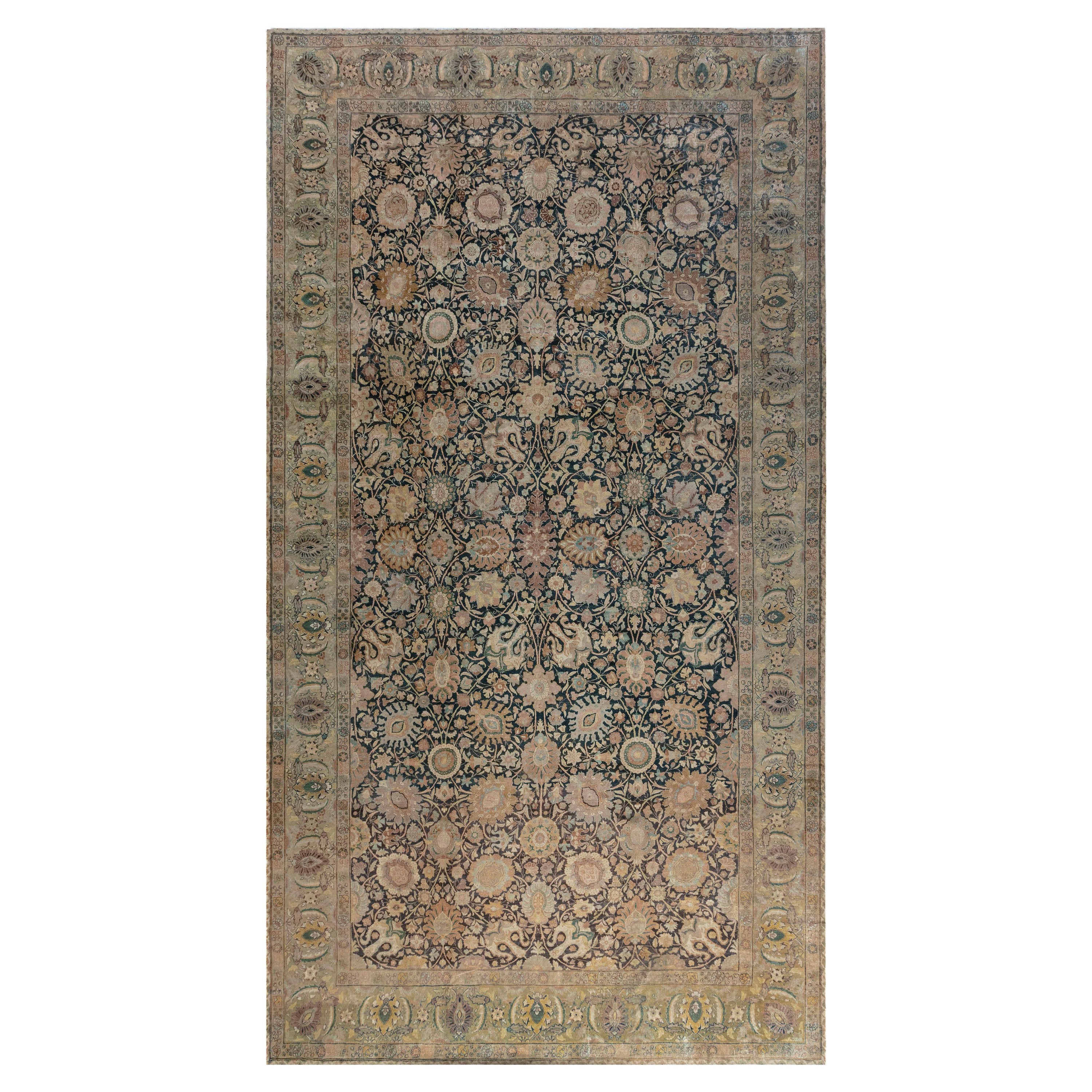 Antique Persian Tabriz Handwoven Wool Carpet For Sale