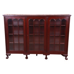 Antique Carved Mahogany Triple Bookcase with Ball and Claw Feet, Circa 1920s