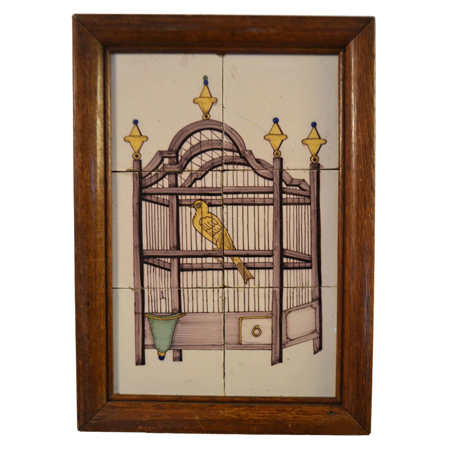 Delfter Fliesenwand mit einem Vogel in einem Käfig aus dem 18. Jahrhundert