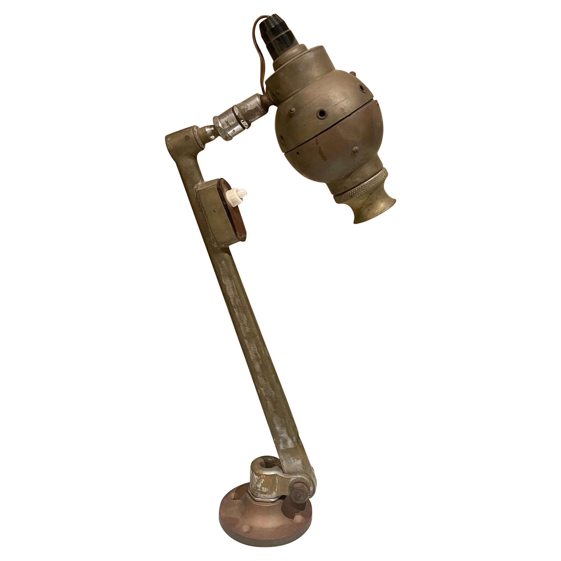 
In the style of French Jieldé an Industrial Table Desk Lamp in patinated brass
Unmarked.
15h x 6d x 3.25 w inches
Original unrestored preowned vintage condition.
Refer to images