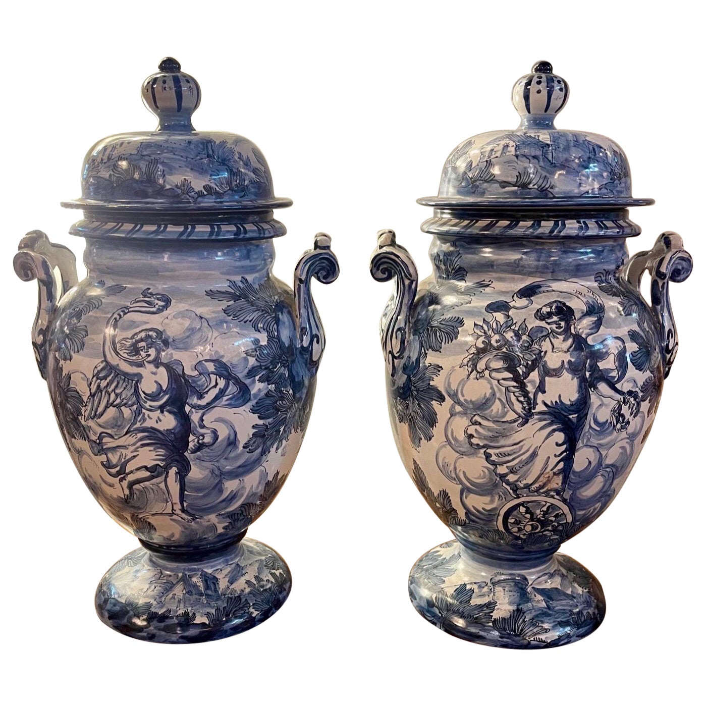 Pair of Blue and White Faience Glazed Lidded Urns For Sale