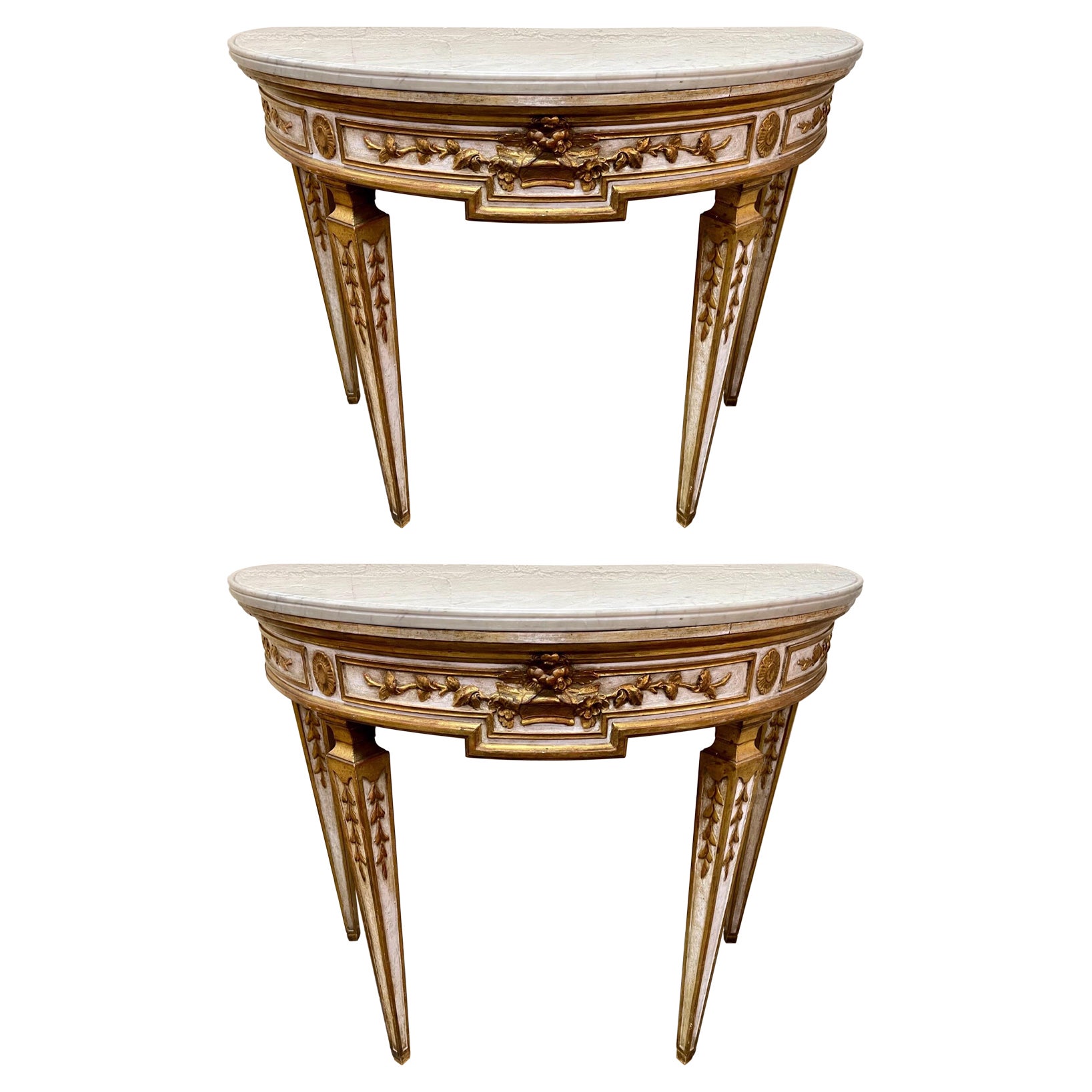 Pair of French Louis XVI Style Carved and Parcel Gilt Consoles with Marble Tops