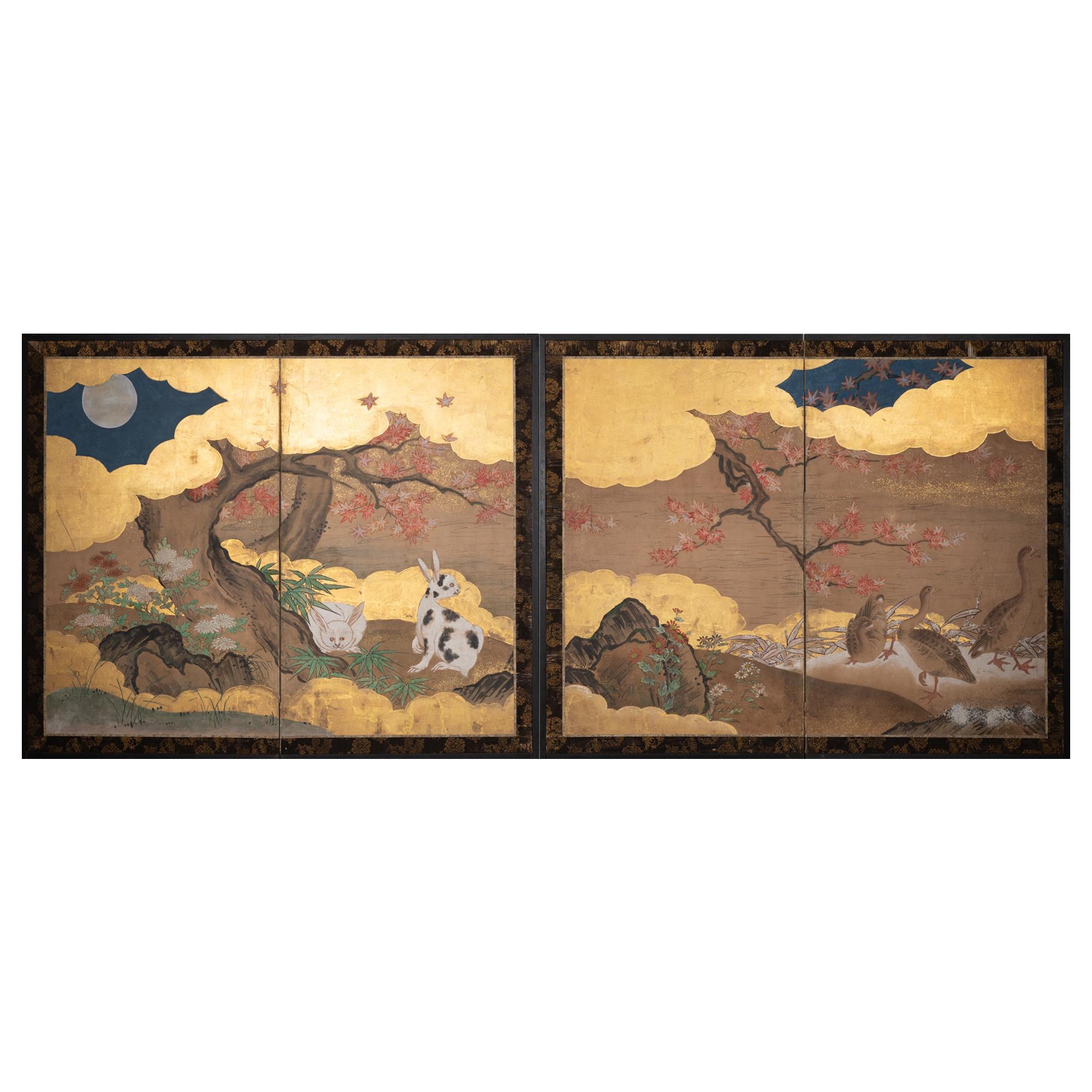 Paire de paravents japonais à deux panneaux représentant des lapins et des oiseaux à l'automne