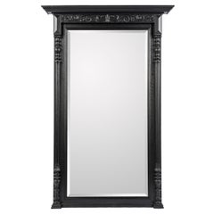 Antique French 19th Century Black Oak Renaissance Mirror with Beveled Edge