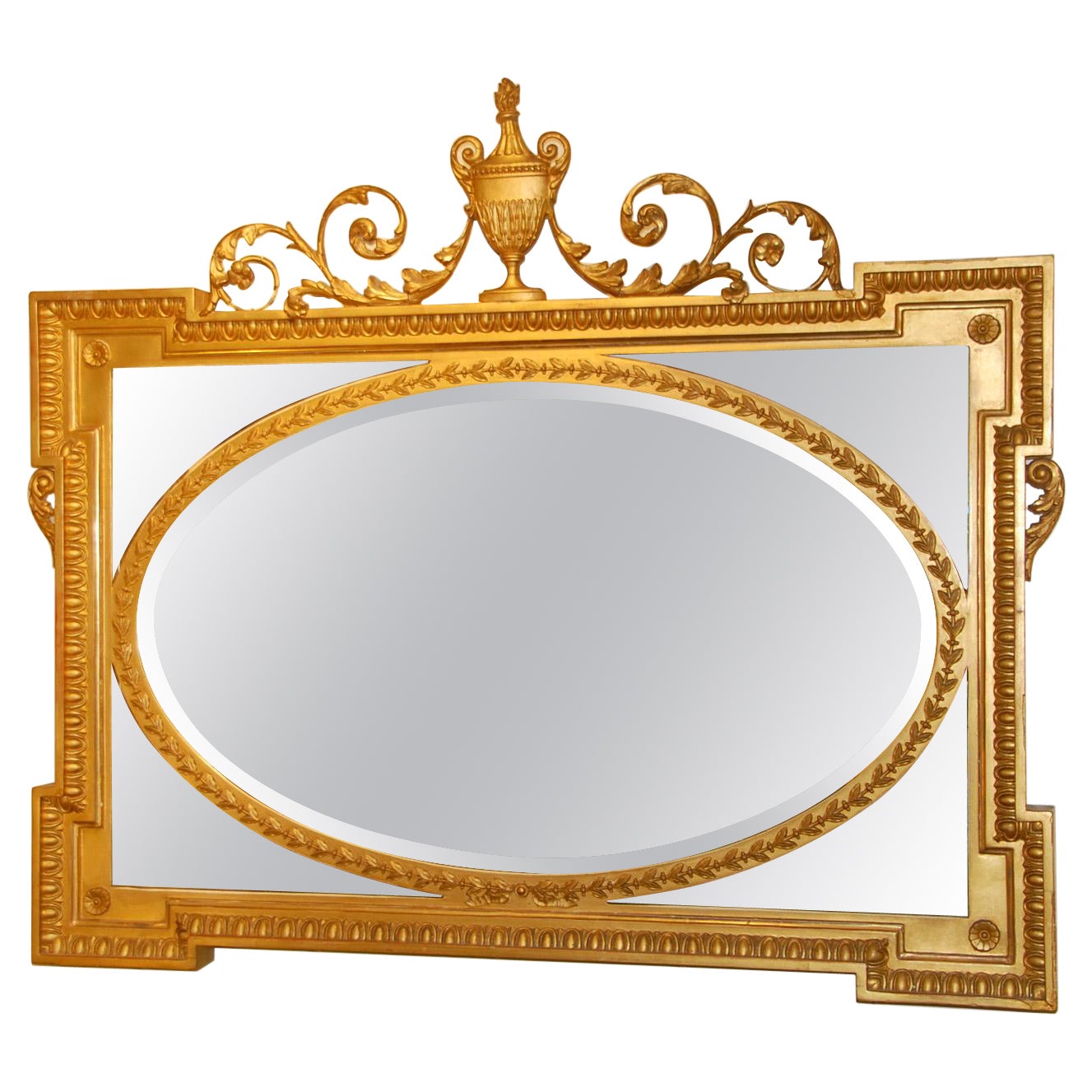 English Edwardian Gold Mirror with Urn and Trailing Leaves Surmounting the Frame For Sale
