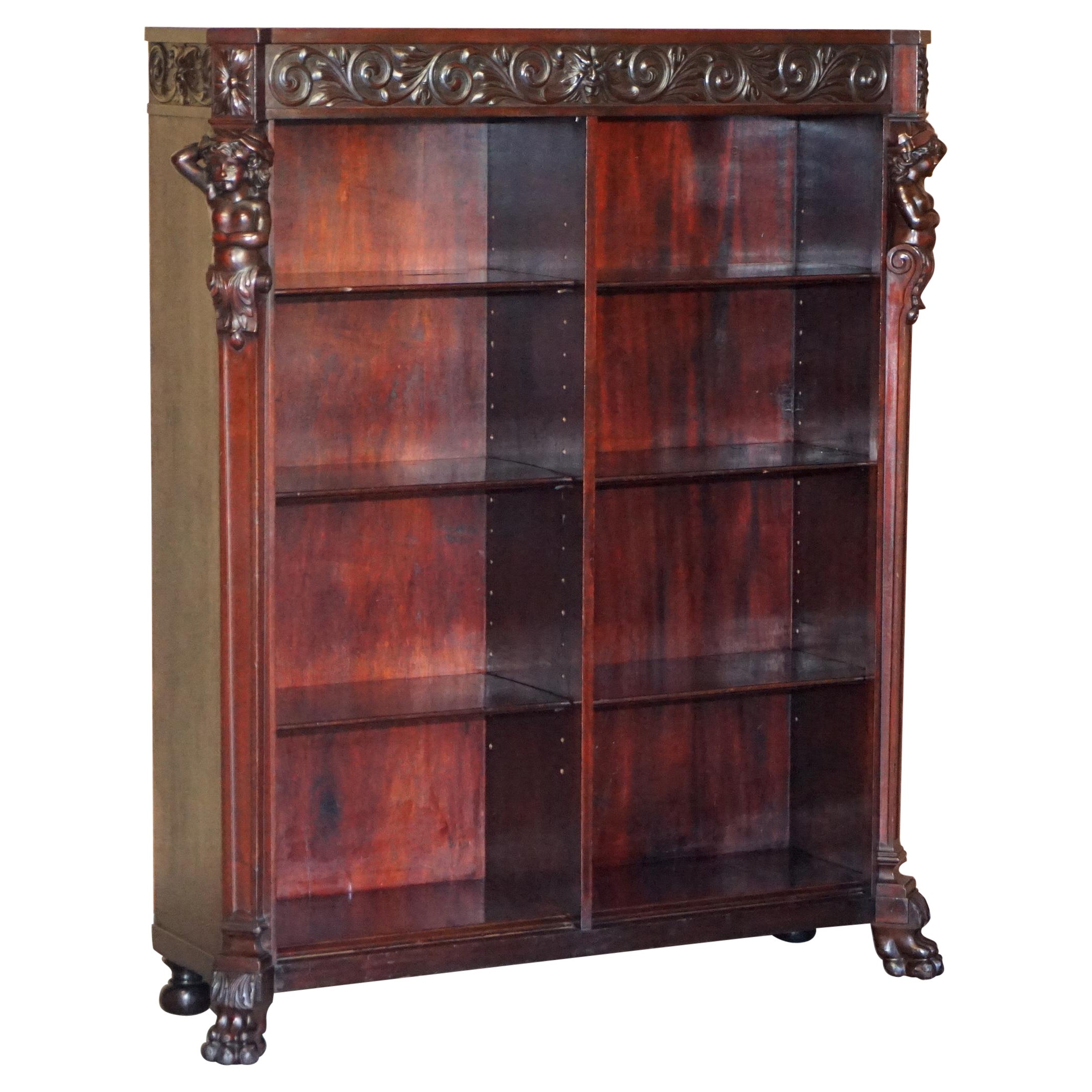 Lovely circa 1900 Hand Carved Library Bookcase in Hardwood with Herm Statues For Sale