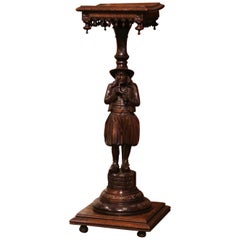 19th Century French Carved Chestnut Pedestal Table with Breton Man Figure