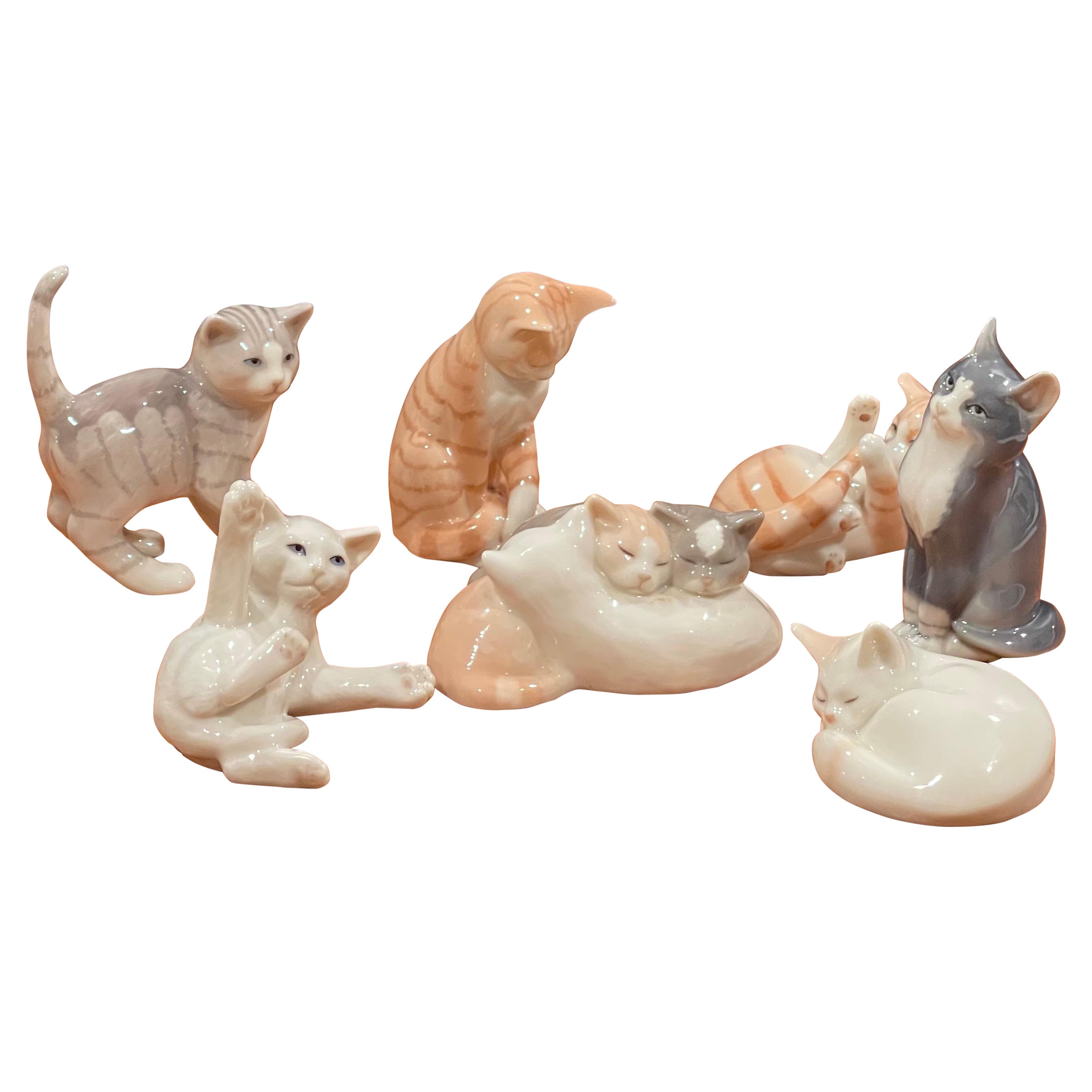Collection of Seven Miniature Porcelain Cat Sculptures by Royal Copenhagen