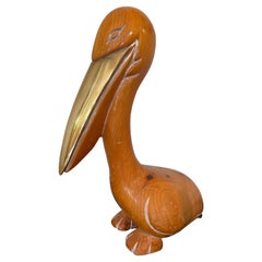 Vintage Mid Century Carved Wood Pelican with Brass Beak