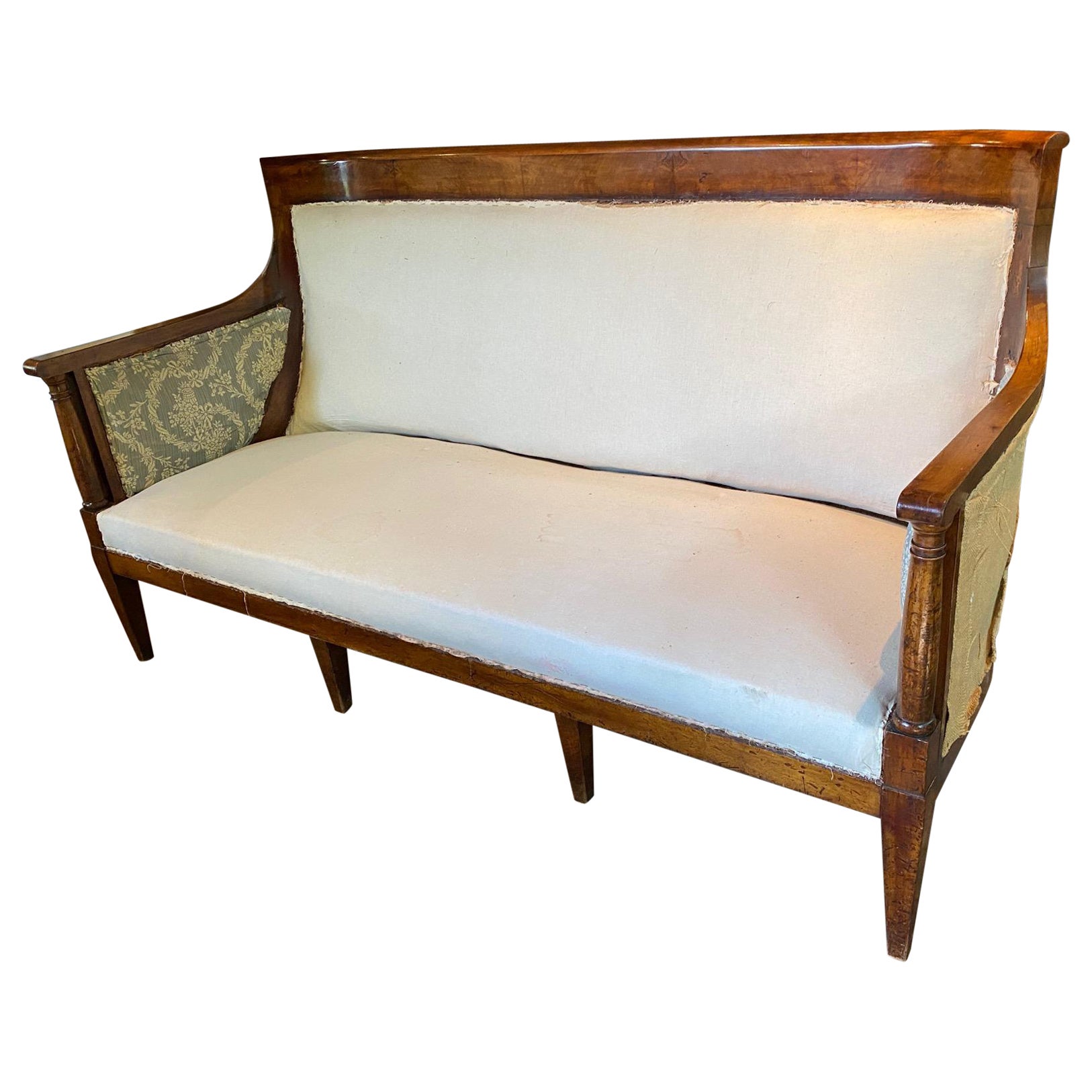 Elegant Directoire Period walnut sofa.
Needs to be reupholstered.