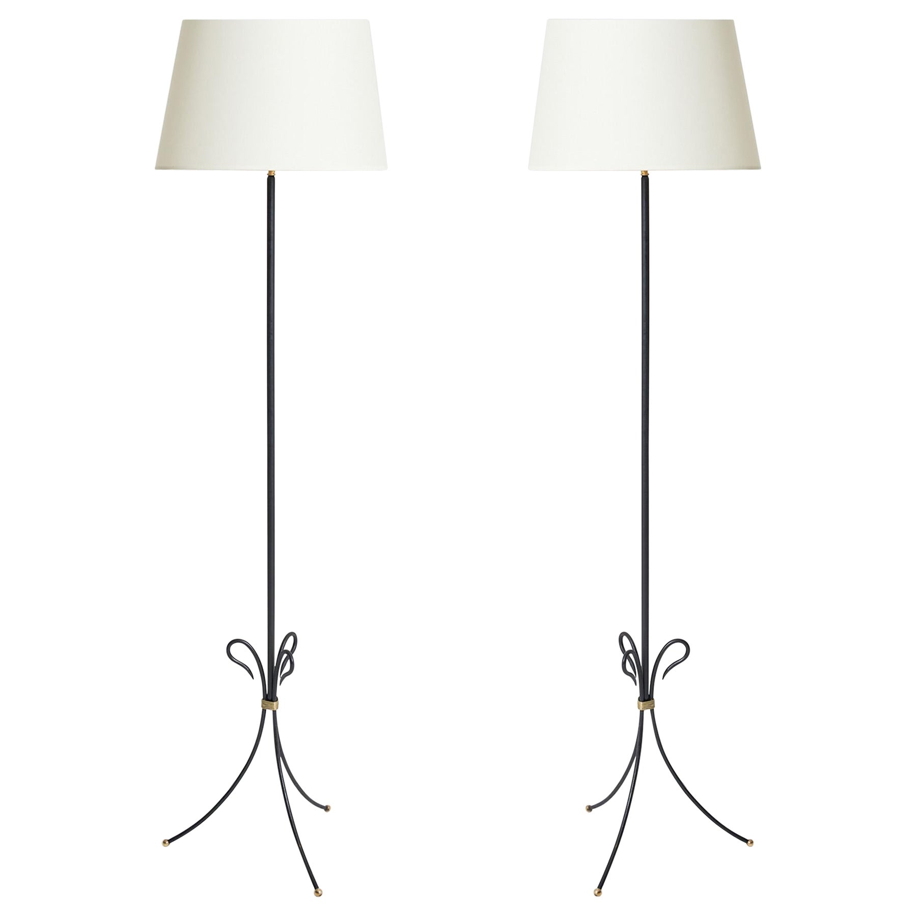 Pair of Mid-Century Black and Brass Floor Lamps