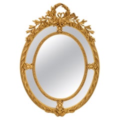 Miroir français du 19ème siècle en bois doré à double cadre