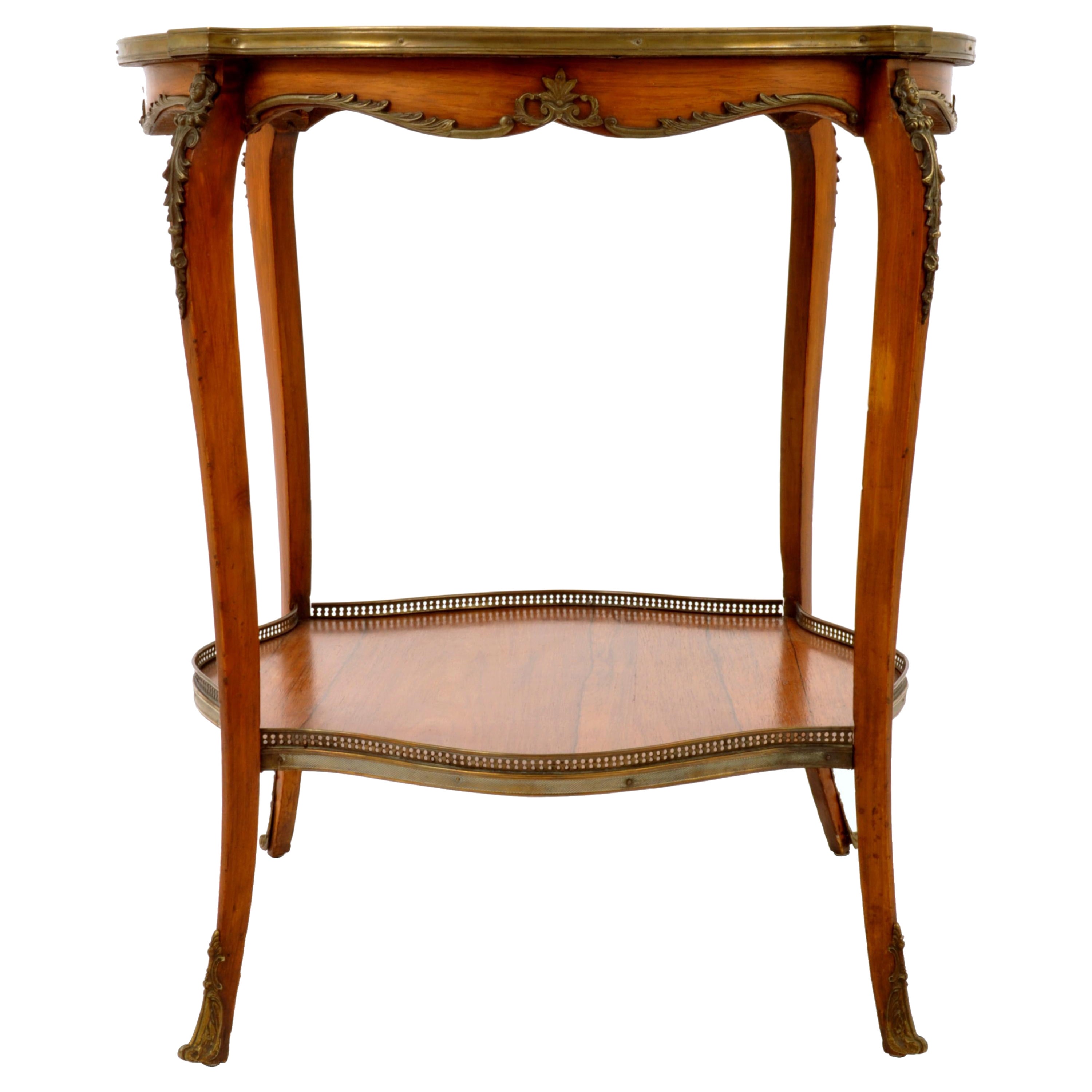 A good 19th century antique French walnut marquetry and ormolu twin tier side/center table, Louis XV style, circa 1880.
The round top having a central floral panel of inlaid fruitwood with a concentric ring of marquetry in a leaf design, the table