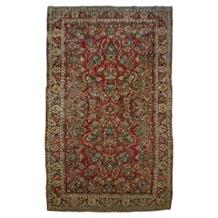 Tapis Sarouk persan ancien à fleurs rouges et dorées, vers les années 1920