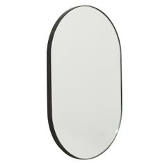Capsula™ Capsule shaped Contemporary Mirror with Patina Frame, Small